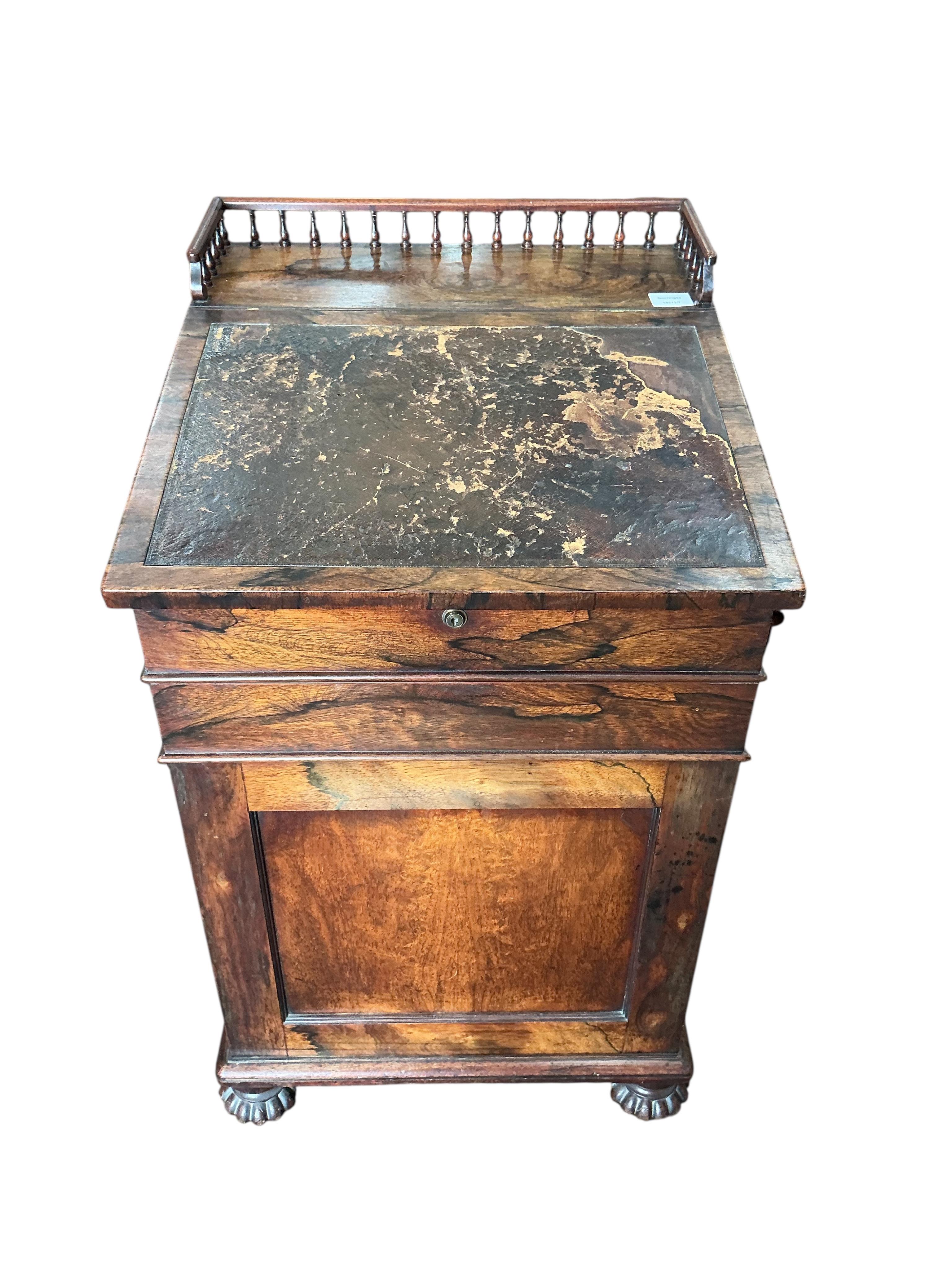 A William IV rosewood davenport, width 52cm, depth 56cm, height 88cm